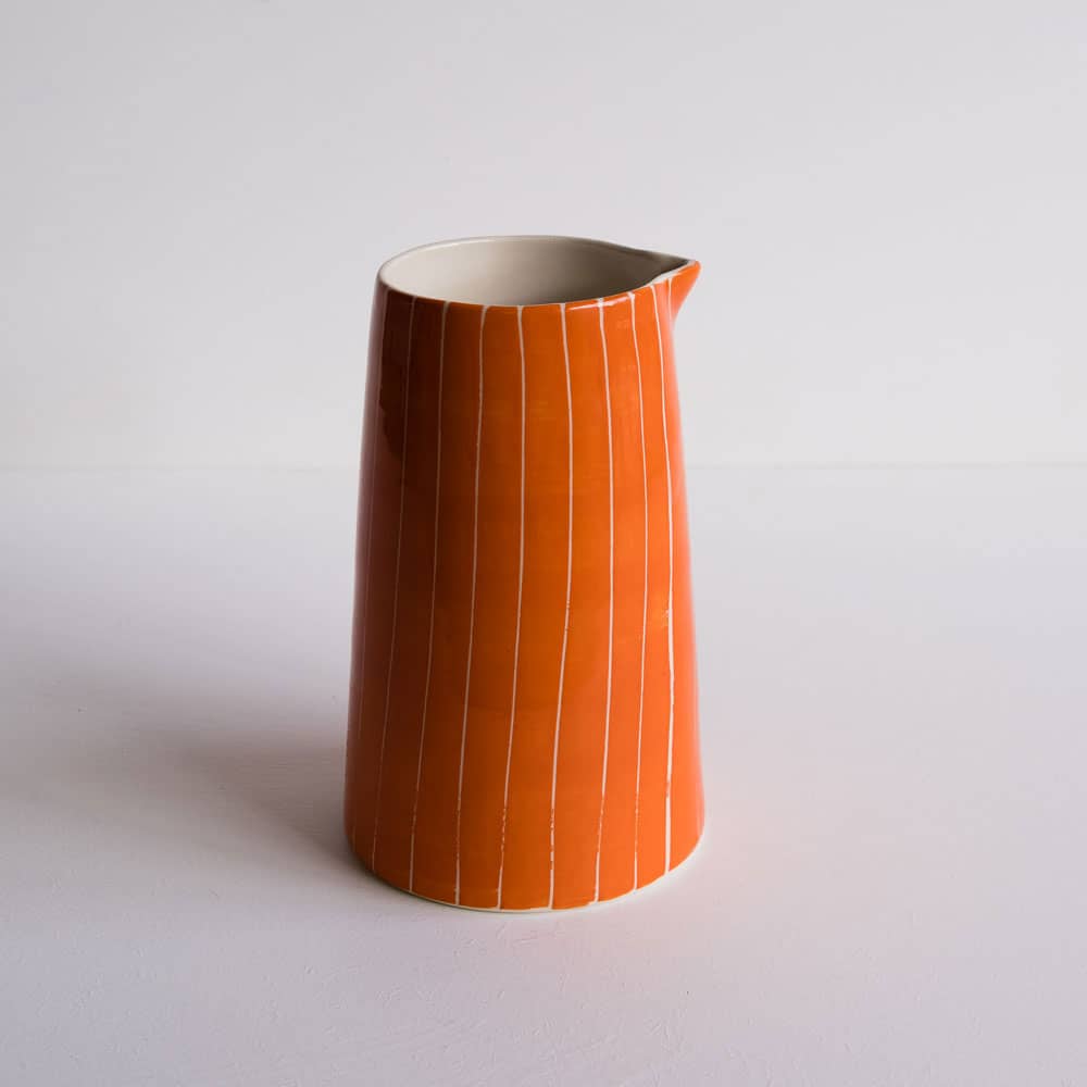 portuguese pottery, orange sgrafitto stripe jug by musango