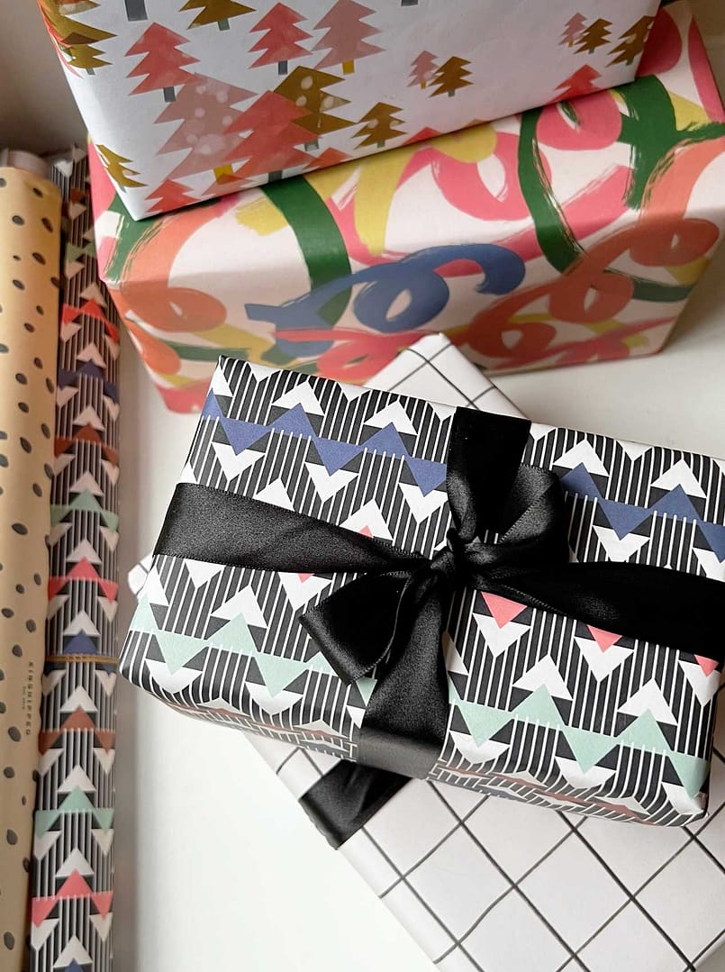 gift wrapped presents in colourful paper gift wrapping